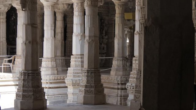 Ranakpur Jain temple in India - ornate detail of white marble carvings