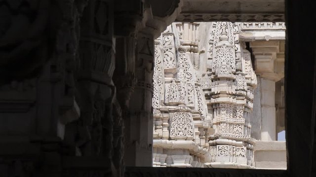 Ranakpur Jain temple in India - ornate detail of white marble carvings