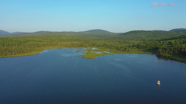Wide descending Aerial over Rangeley Lake, Western Maine