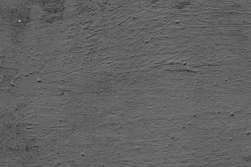 Texture of a concrete wall with cracks and scratches which can be used as a background