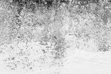 Texture of a concrete wall with cracks and scratches which can be used as a background
