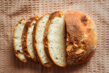 French bread. HOMEMADE BREAD ON WHEAT SOURDOUGH
