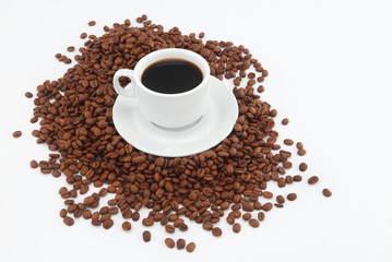 cup of coffee with beans on white background
