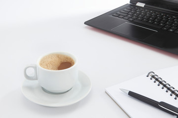 Obraz na płótnie Canvas cup of coffee and laptop