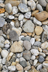 Colorful machined stones on the ground.