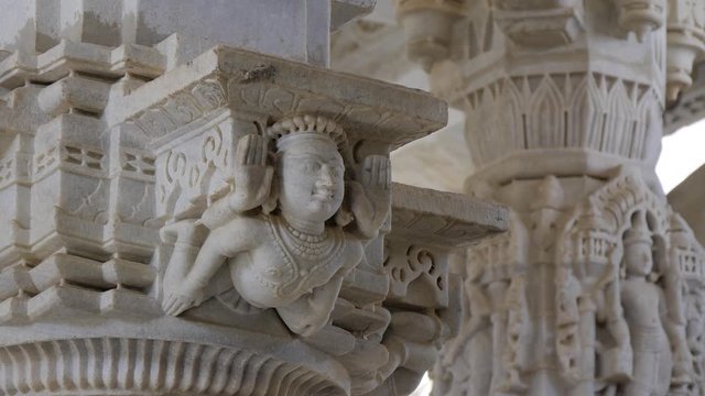 Ranakpur Jain temple in India - ornate detail of white marble carvings