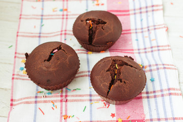 Home-made fragrant chocolate cupcakes with wheat ferment.