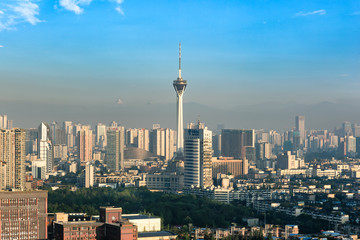 Naklejka premium Sichuan TV tower and skyline at morning with the highest peak of Mount Siguniang background.