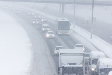 Traffic On Highway During Snow Storm