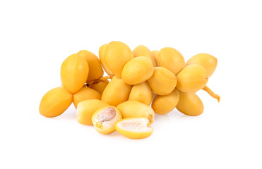 yellow date palm fruit on white background