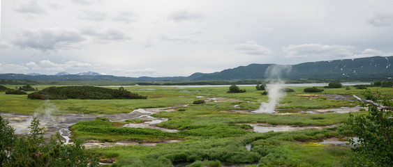 Panorama of hot springs, boiling mud pools and warm toxic lakes in Uzon caldera. Kronotsky Nature...