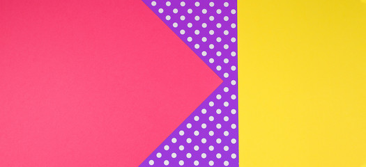 Abstract geometric yellow, purple and pink polka dot paper banner background