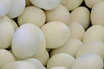 Many raw eggs in the basket selling at the market