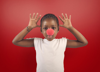 Little girl makes grimace with red noise