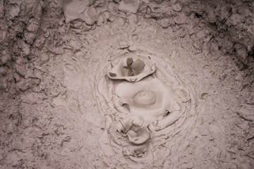 Bubbling mud volcano in Uzon caldera.  Kronotsky Nature Reserve in Russian far east, Kamchatka...