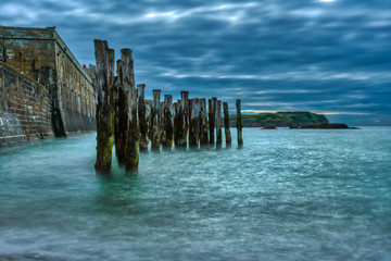 Quay wall in the waves of St. Malo