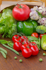 Healthy food in full paper bag of different products, vegetables. Top view. Food background.