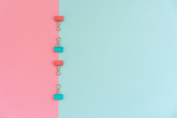 School stationery on a pink and blue background. Back to school creative background, template. Creative, fashionable, minimalistic, office workspace with supplies on pink-blue background. Flat lay.