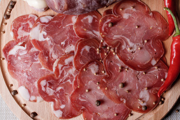 Salami, sausage, prosciutto with red pepper