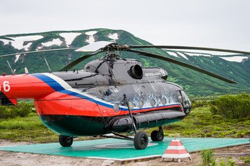 Mi-8 VIP in green meadow. Medium twin-turbine helicopter by Soviet Union. Common transport in Russian far east in order to reach remote areas.