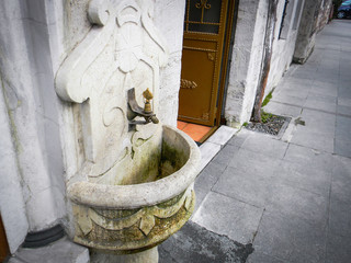The image of old Turkish Ottoman style faucet on the street of Istanbul, Turkey.