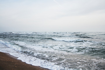 Black sea and cloud. Waves 
