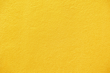 Gold paint surface of cement wall texture background