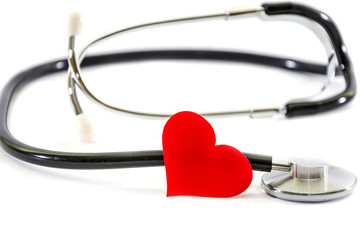 medical stethoscope and red heart isolated on white background