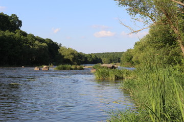 Small rapids on flat rivers attract tourists and travelers in the summer