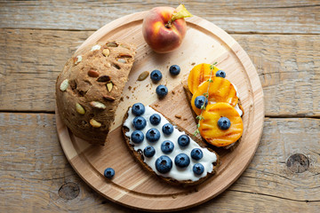  Bruschetta with berries Board Healthy breakfast Vegetarian food