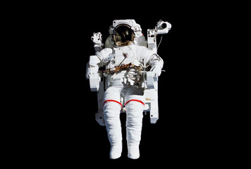 The astronaut in a space suit, in an outer space, without insurance, isolated on a black background. Elements of this image were furnished by NASA - obrazy, fototapety, plakaty