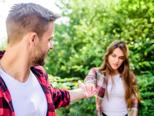 Fototapeta premium trust me. man in selective focus with girl in park. couple in love. family weekend. romantic date. happy valentines day. summer camping in forest. couple first meet outdoor. Relations