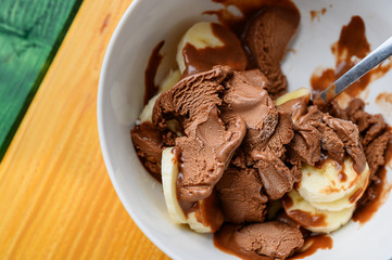 Chocolate ice cream or mousse with fresh banana slices
