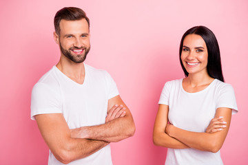 Portrait of his he her she two nice attractive lovely cheerful cheery spouses folded arms idyllic harmony match isolated over pink pastel background