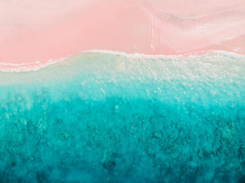 Tropical pink beach with blue ocean. Komodo islands