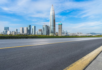Fototapeta na wymiar urban traffic road with cityscape in background, China.