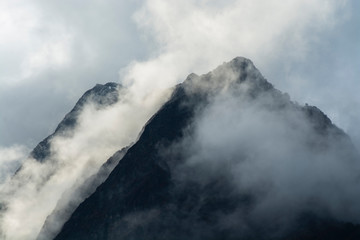 Mountain peaks in mist, North Sikkim, India