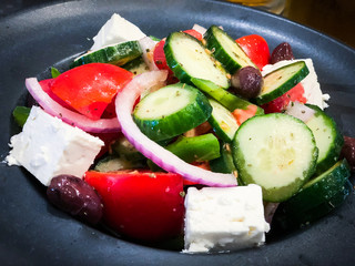 tasty greek salad with fresh ingredients