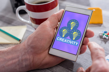 Creativity concept on a smartphone