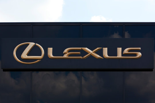 Dusseldorf, germany - June 12, 2011: Golden Lexus sign on car retailer's building. 