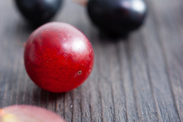 red grapes on black wood table