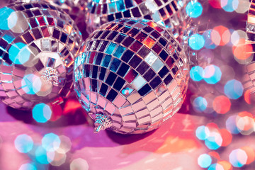 disco ball bauble on pink background.  party concept