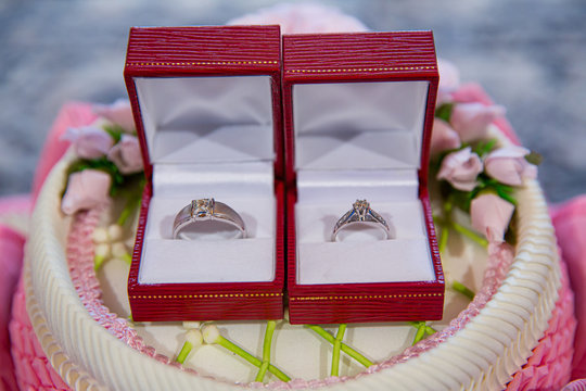 Diamond ring, wedding ring, Wedding Ring bride price. Wedding symbols. Wedding ceremony. image for objects and article.rings on wooden surface, symbol of couple