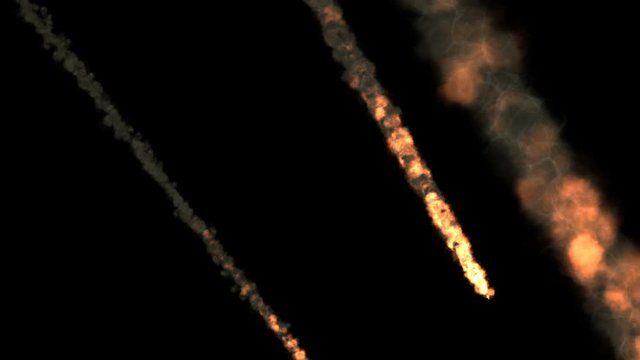 Animation of meteorite falling through the atmosphere burning along the way. Several meteors or asteroids, trails of fire and smoke.
