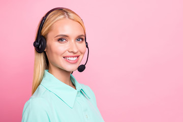 Close up turned photo of cheerful professional looking with toothy smile wearing mint color shirt...