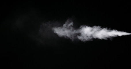 White smoke trail isolated on black background.