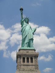 Fototapeta na wymiar New York City USA Statue of Liberty low-angle shot summer blue sky