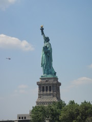 Fototapeta na wymiar Statue of Liberty from the side New York City USA helicopter