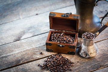 turkish coffee pot on wooden table. aroma drink beverage