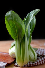 The green fresh bok choy on table